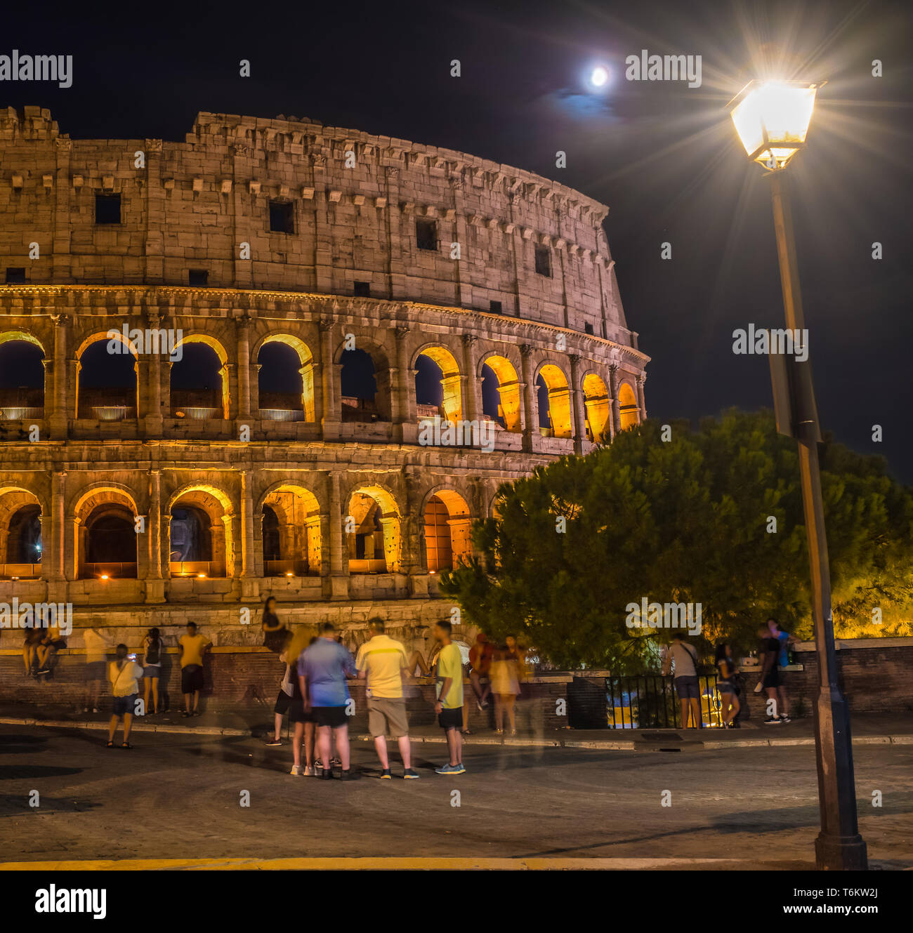 Long exposure of the Colosseum and a public lighting pole in Rome - Italy Stock Photo