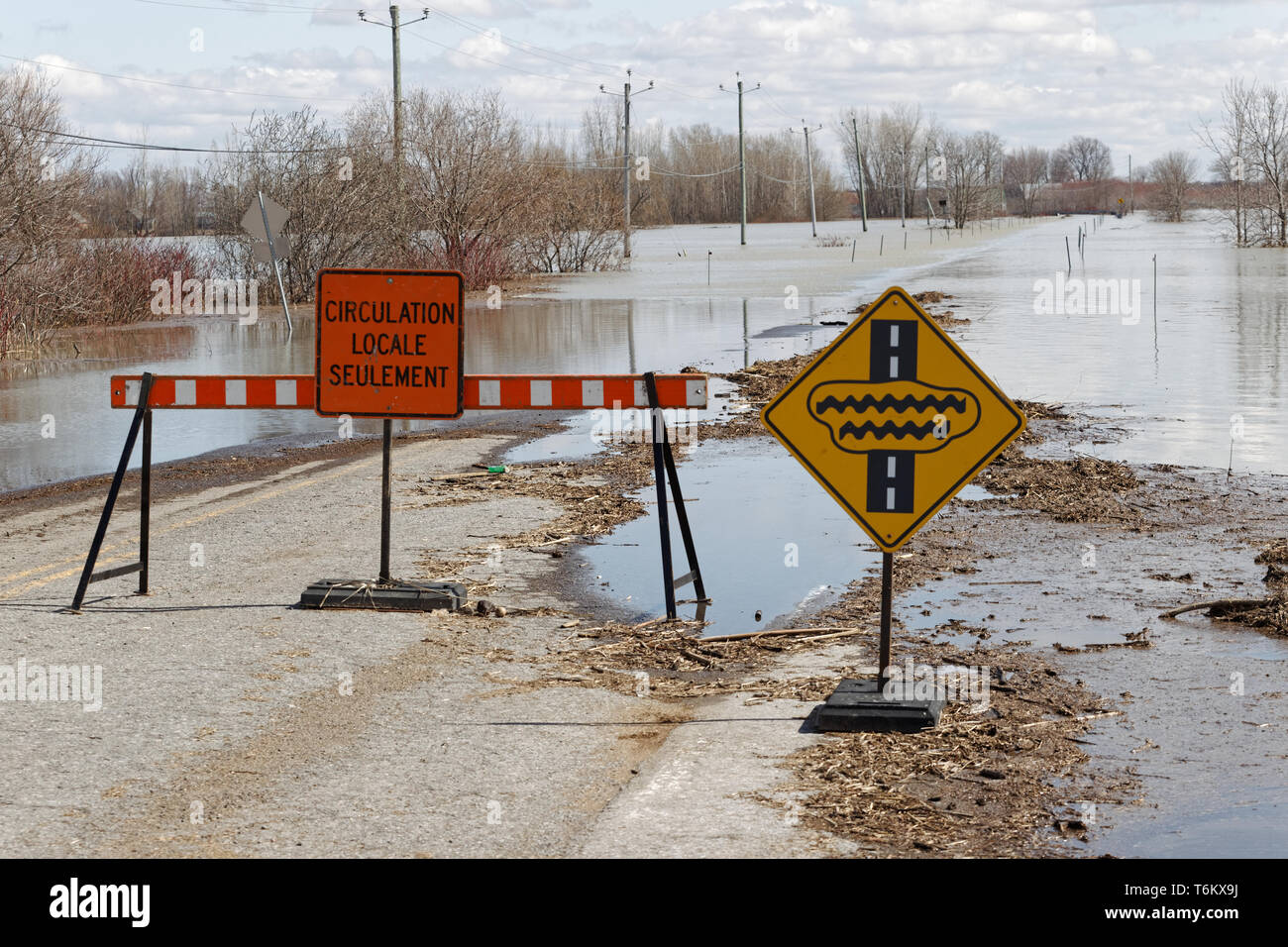 Quebec,Canada. A flooded road in Saint-Barthelemy caused by the Spring thaw. Stock Photo