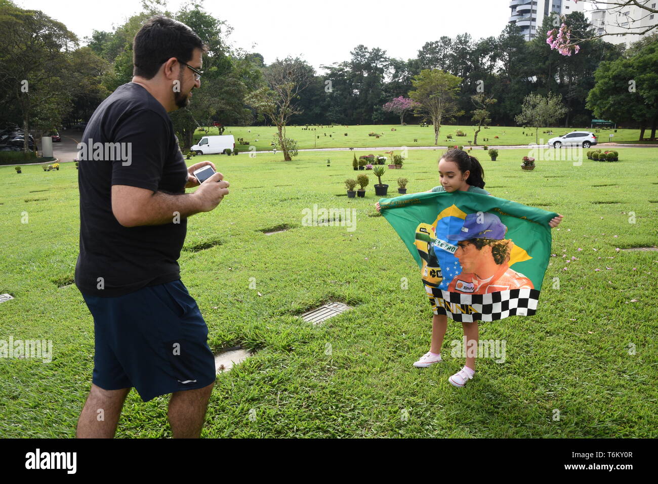 Fans visit the tomb of Formula 1 driver Ayrton Senna at Morumbi