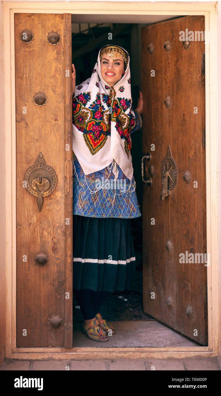oung beautiful Iranian lady in traditional clothing in a traditional ...