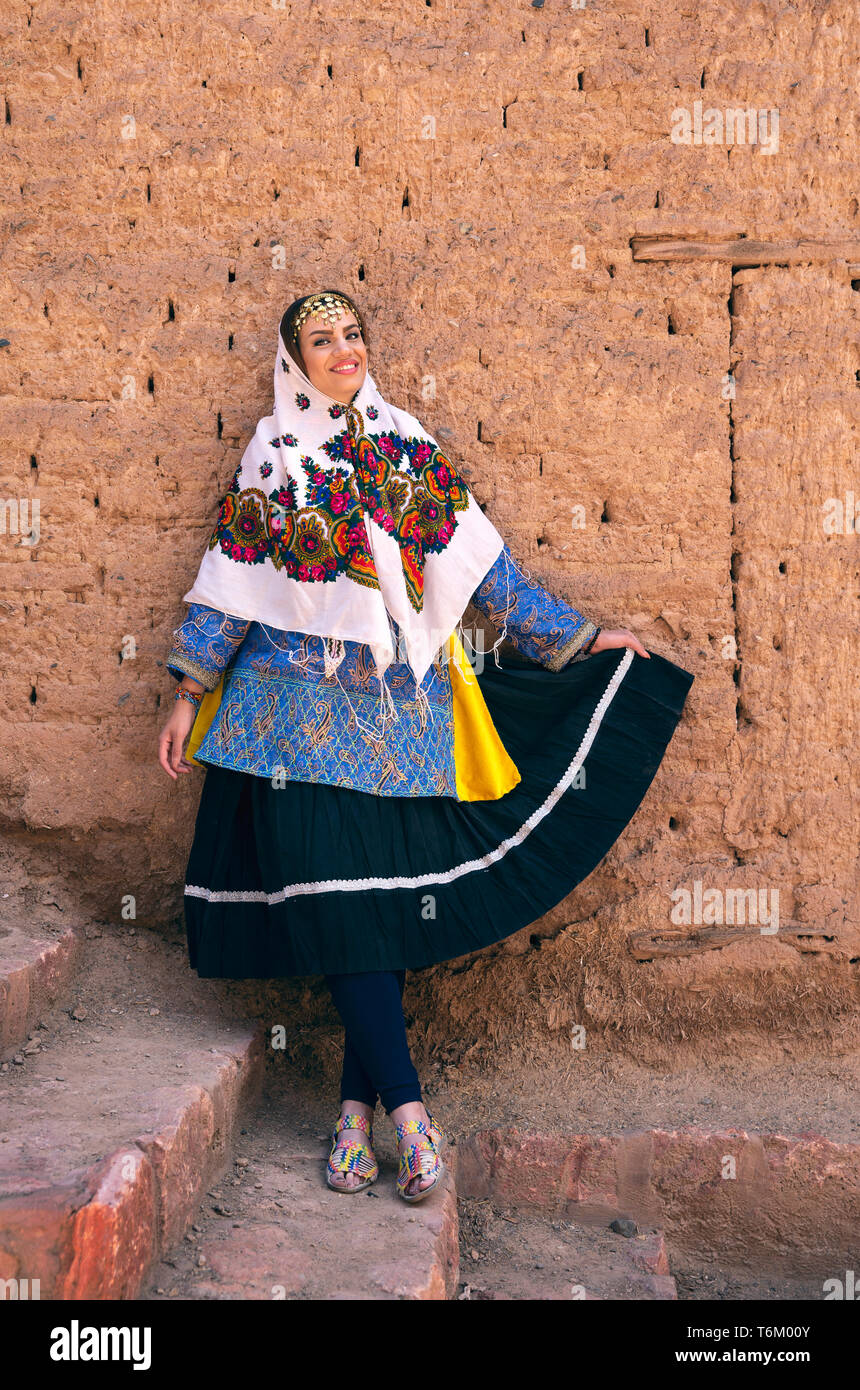 oung beautiful Iranian lady in traditional clothing in a traditional ...