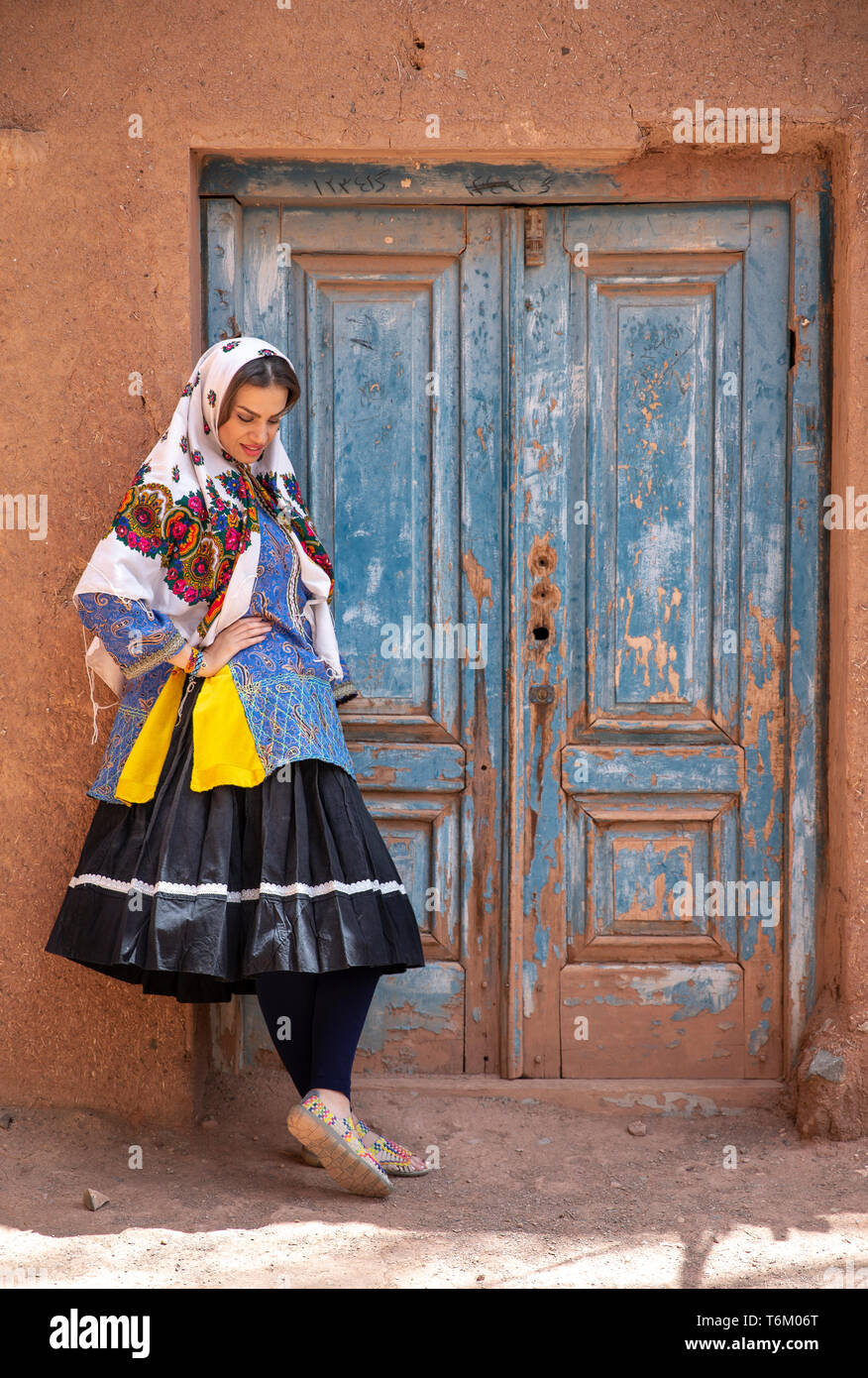 oung beautiful Iranian lady in traditional clothing in a traditional ...