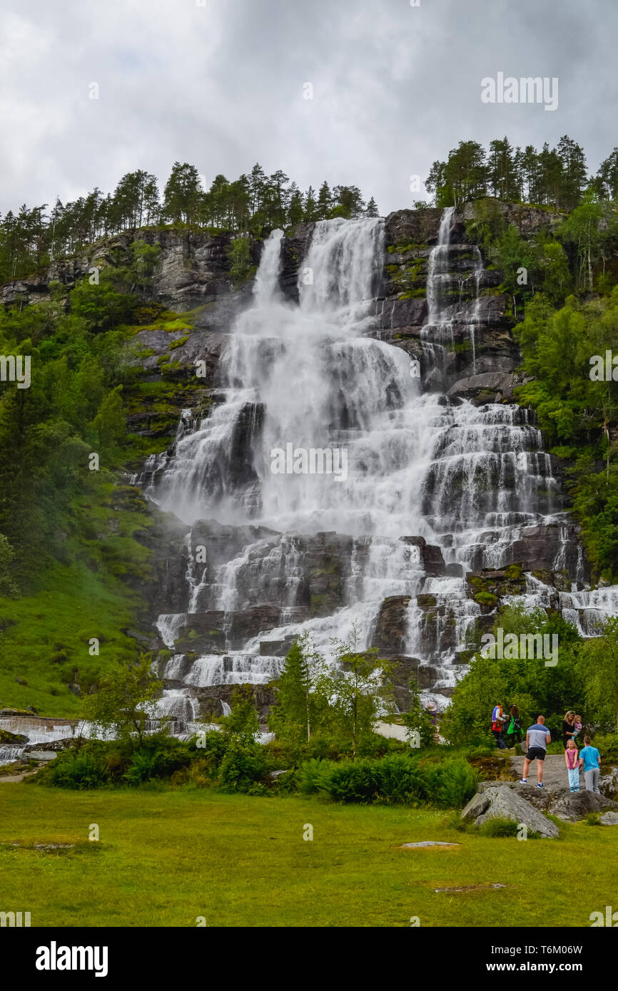 Tvindefossen Waterfall is a gorgeous 152m waterfall near Voss tumbling in strands with a graceful character. Tourism, popular, Norway, Scandinavia. Stock Photo