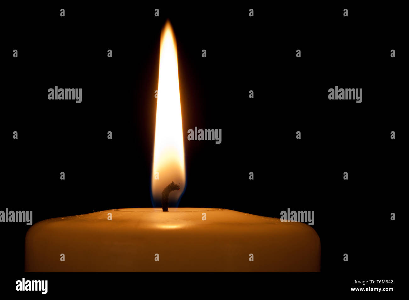 Detail of a burning candle in the dark Stock Photo Alamy