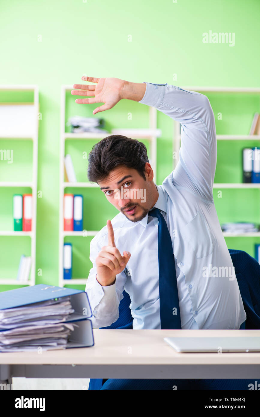 Work Training Session Break The employee doing exercises during break at work Stock Photo - Alamy