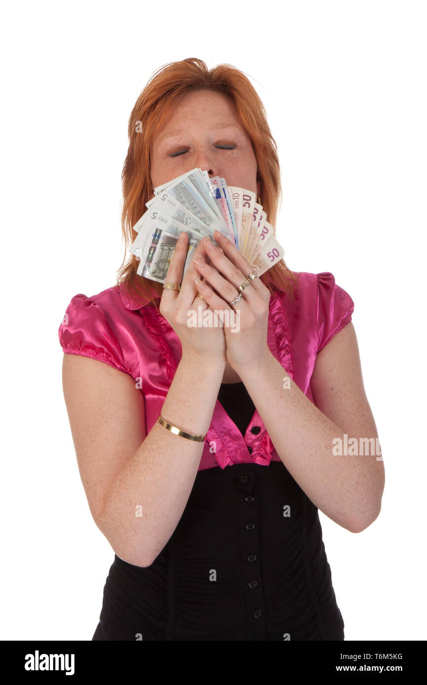 Beautiful young woman with money isolated on white background Stock Photo