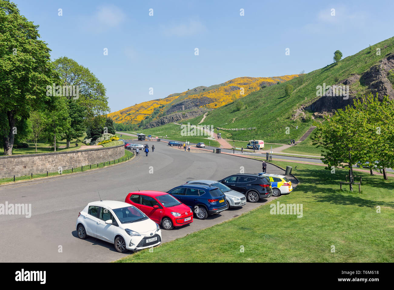 Parking place with cars near mountain Arthur's seat in Edinburgh Stock Photo