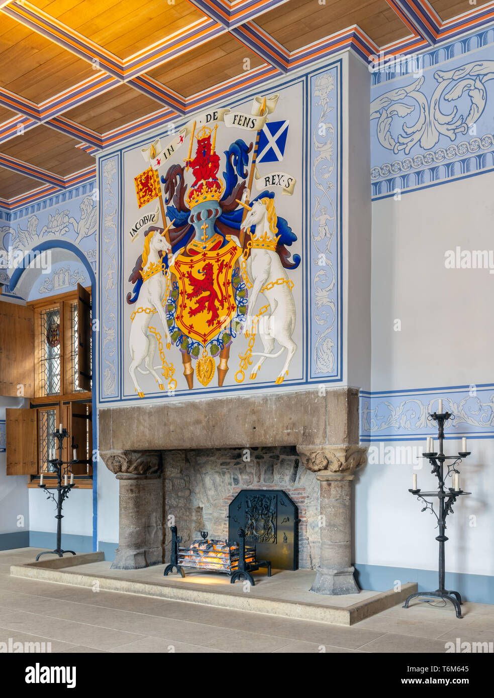 Medieval room of Stirling Castle with hearth and wall decorations Stock