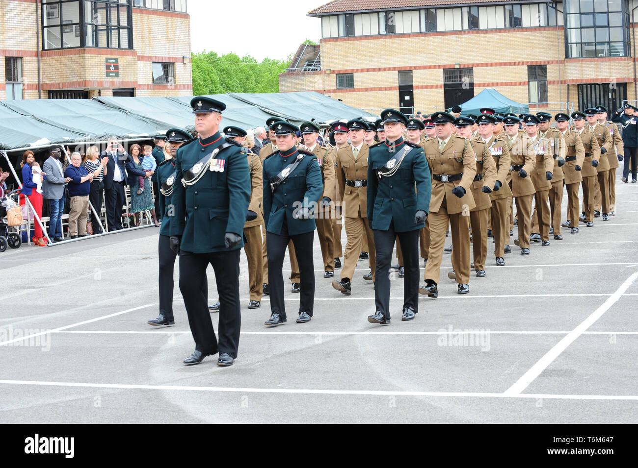 Soldiers, Officers, and Bandsmen are seen during the parade, as The ...