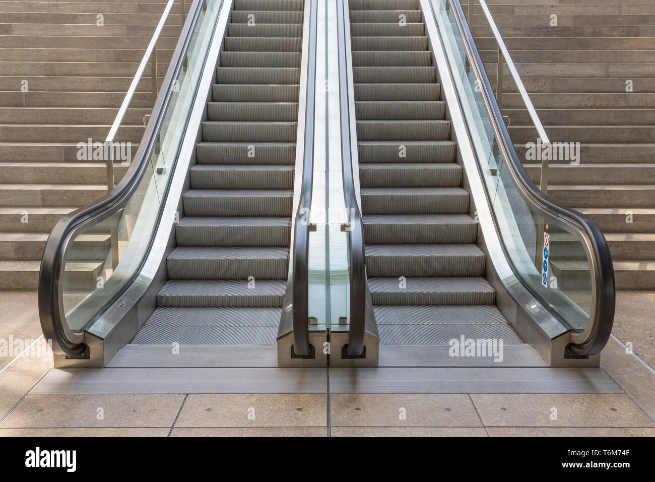 Stone stairs with elevator in modern building Stock Photo Alamy
