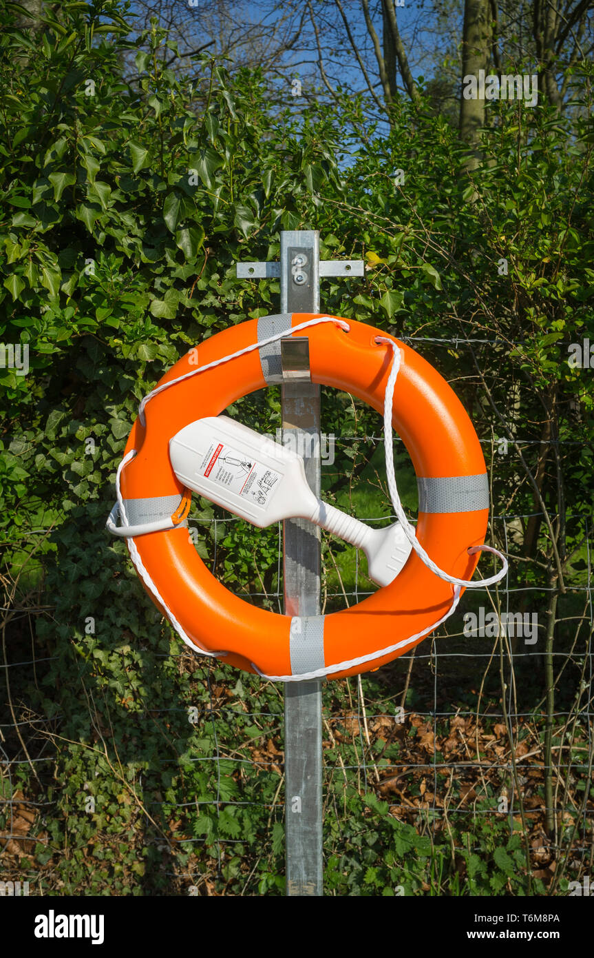 Modern lifebuoy with integral throw line holder by the Thames at Goring-on-Thames, Oxfordshire. Stock Photo