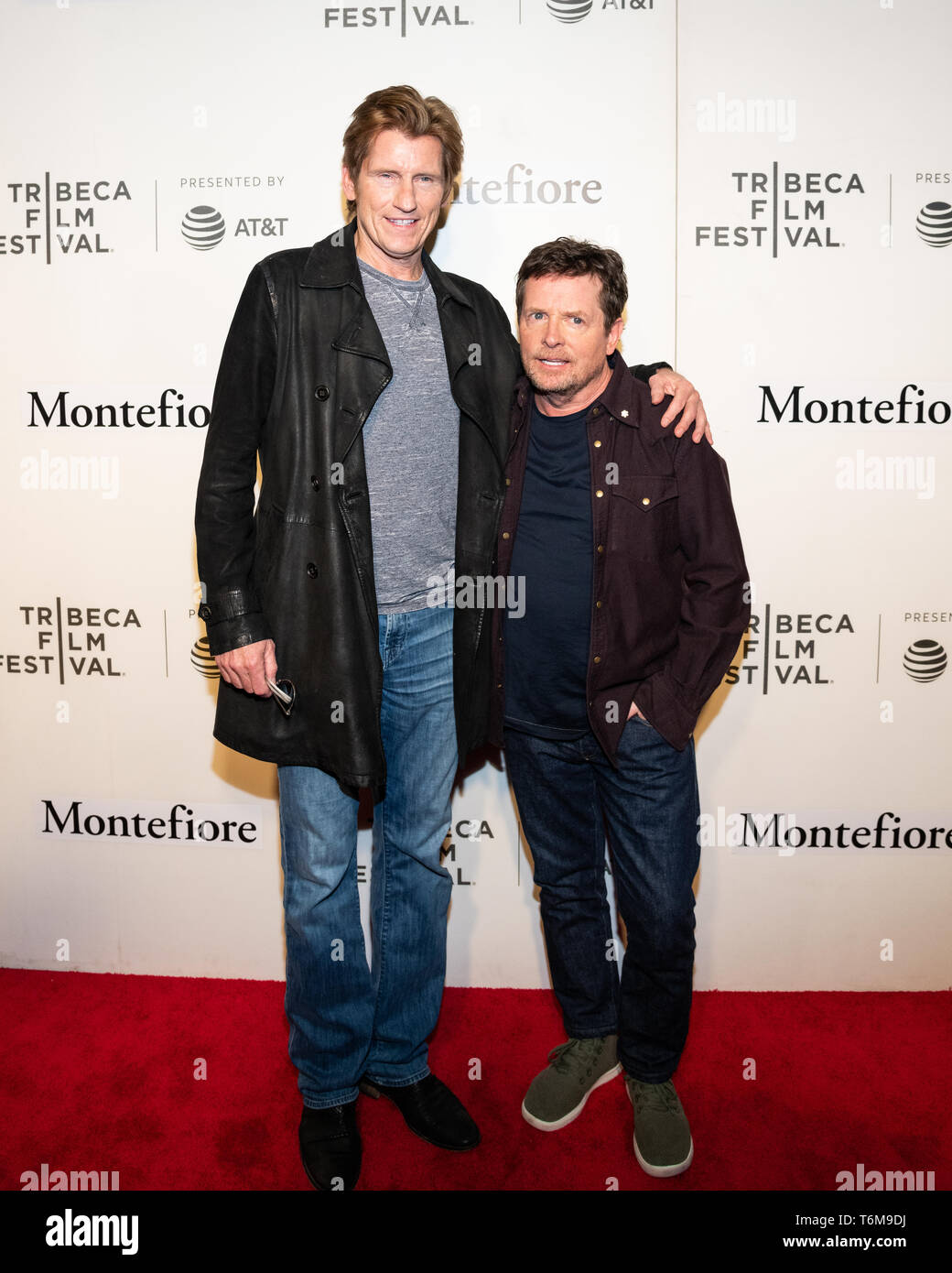 Denis Leary and Michael J. Fox are seen on the red carpet for Tribeca Talks, Storytellers, Michael J. Fox with Denis Leary during the Tribeca Film Festival at The Stella Artois Theatre in New York. Stock Photo