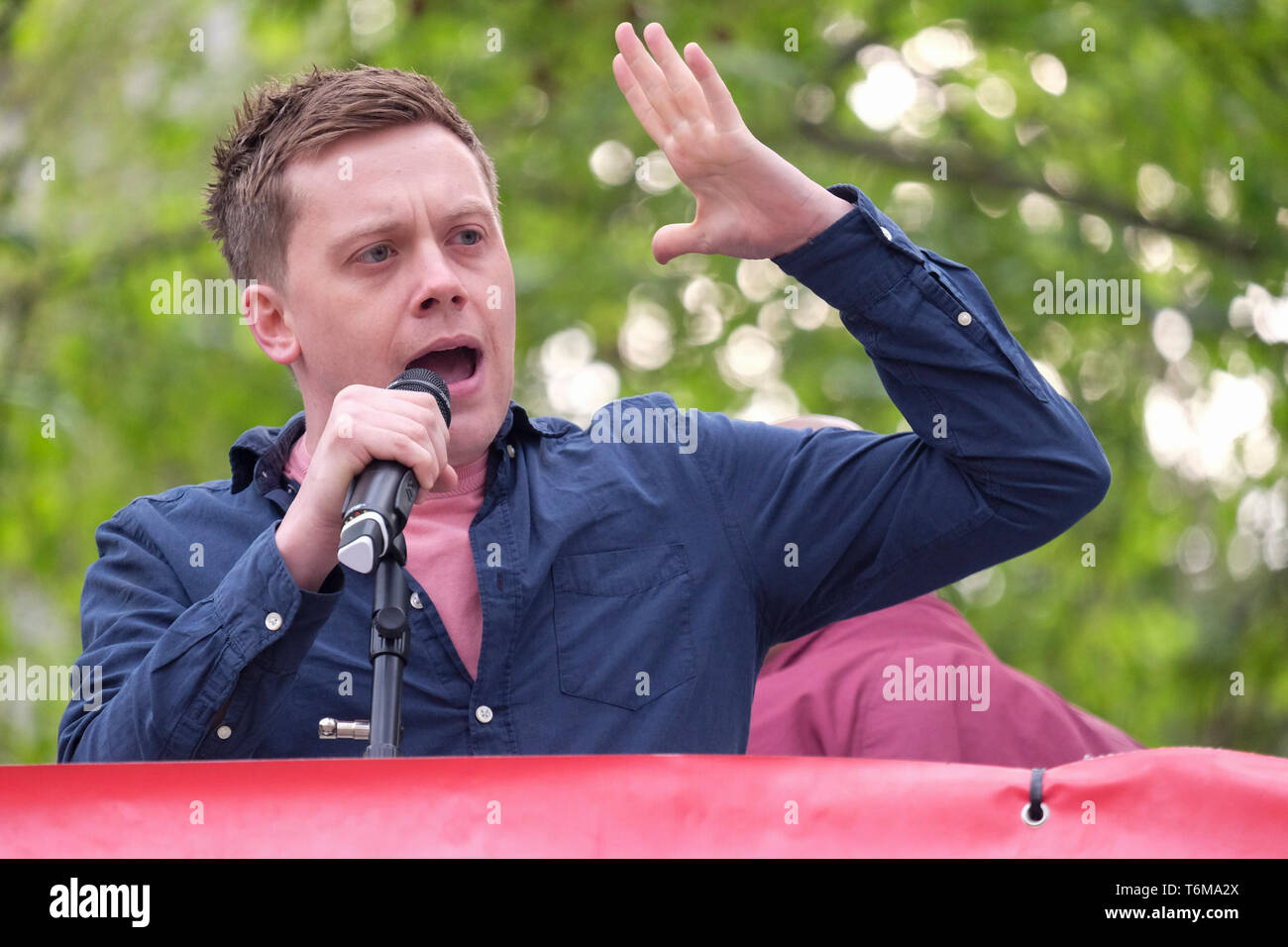 Owen Jones, newspaper columnist and left-wing political activist addresses rally in Parliament Square, Westminster, London, UK Stock Photo