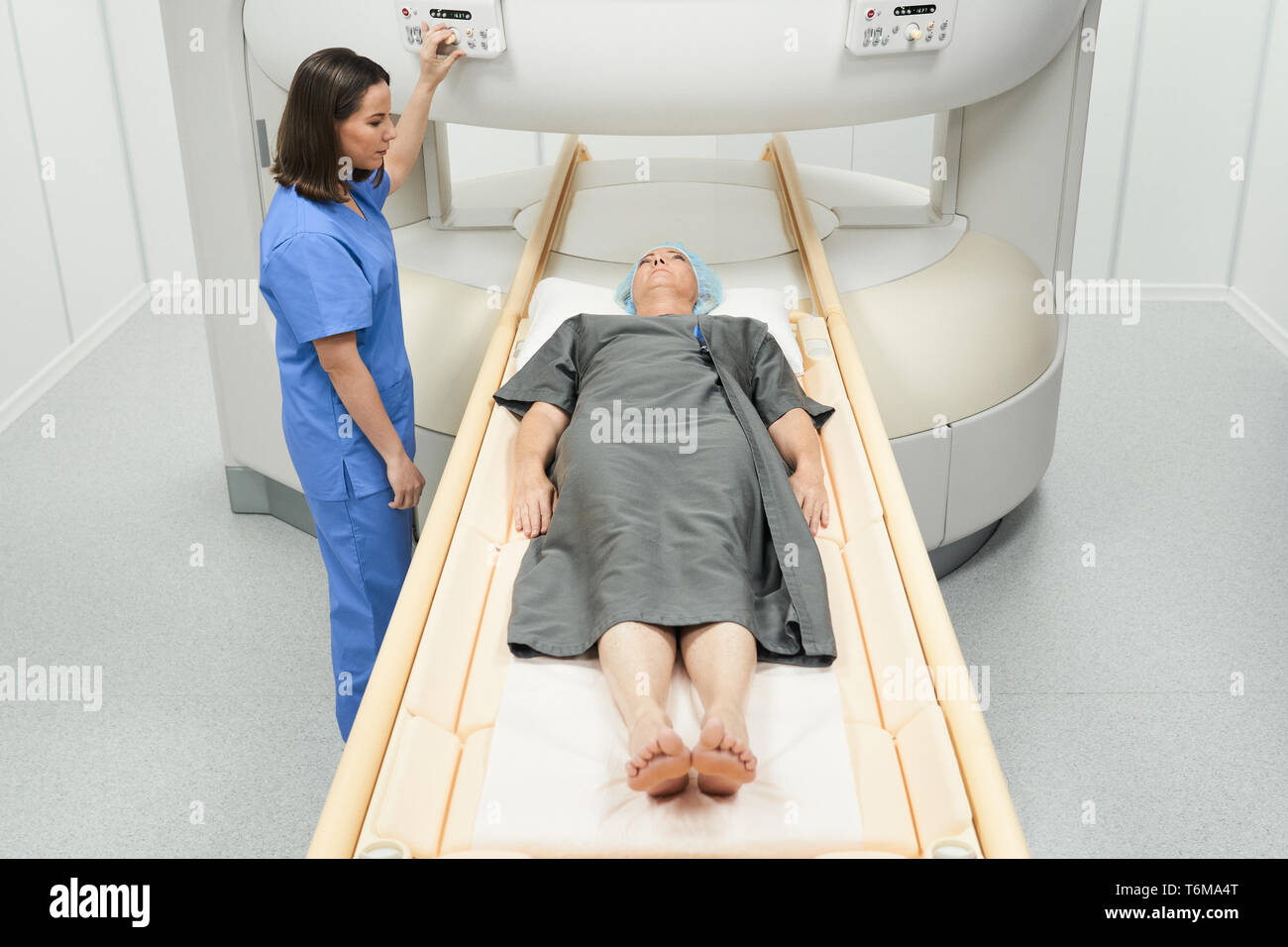 Mature Patient With Health Problems And Doctor In Medical Center Stock Photo