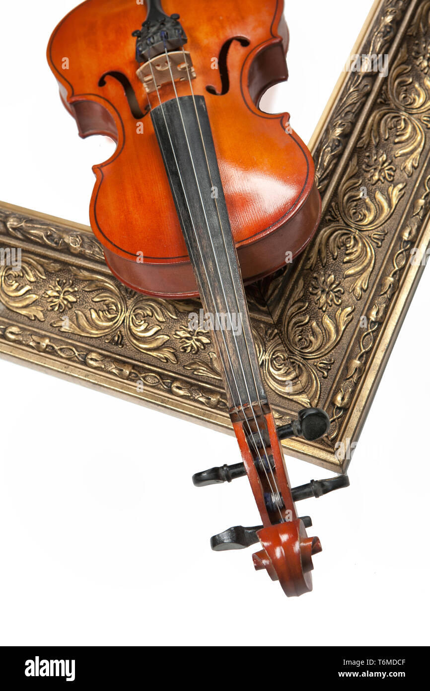 Violin And Golden Frame Stock Photo Alamy