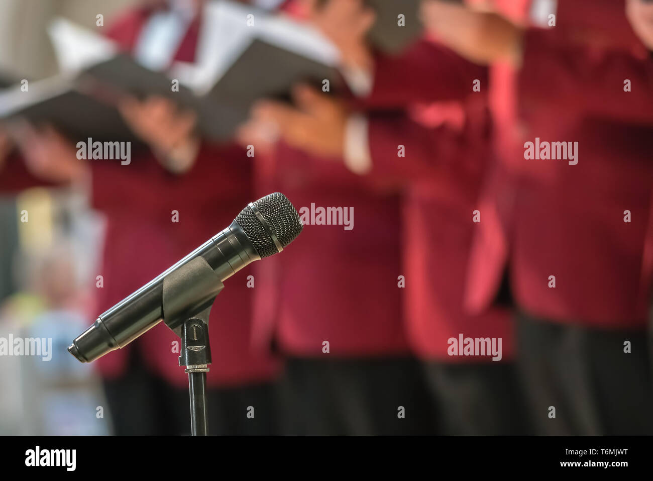 Microphone and mens choir Stock Photo Alamy