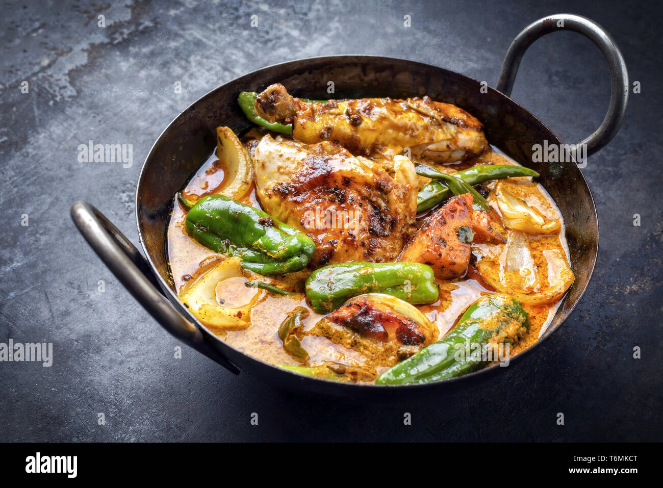 Traditional Thai kaeng massaman coconut chicken curry with jalapeno Stock Photo
