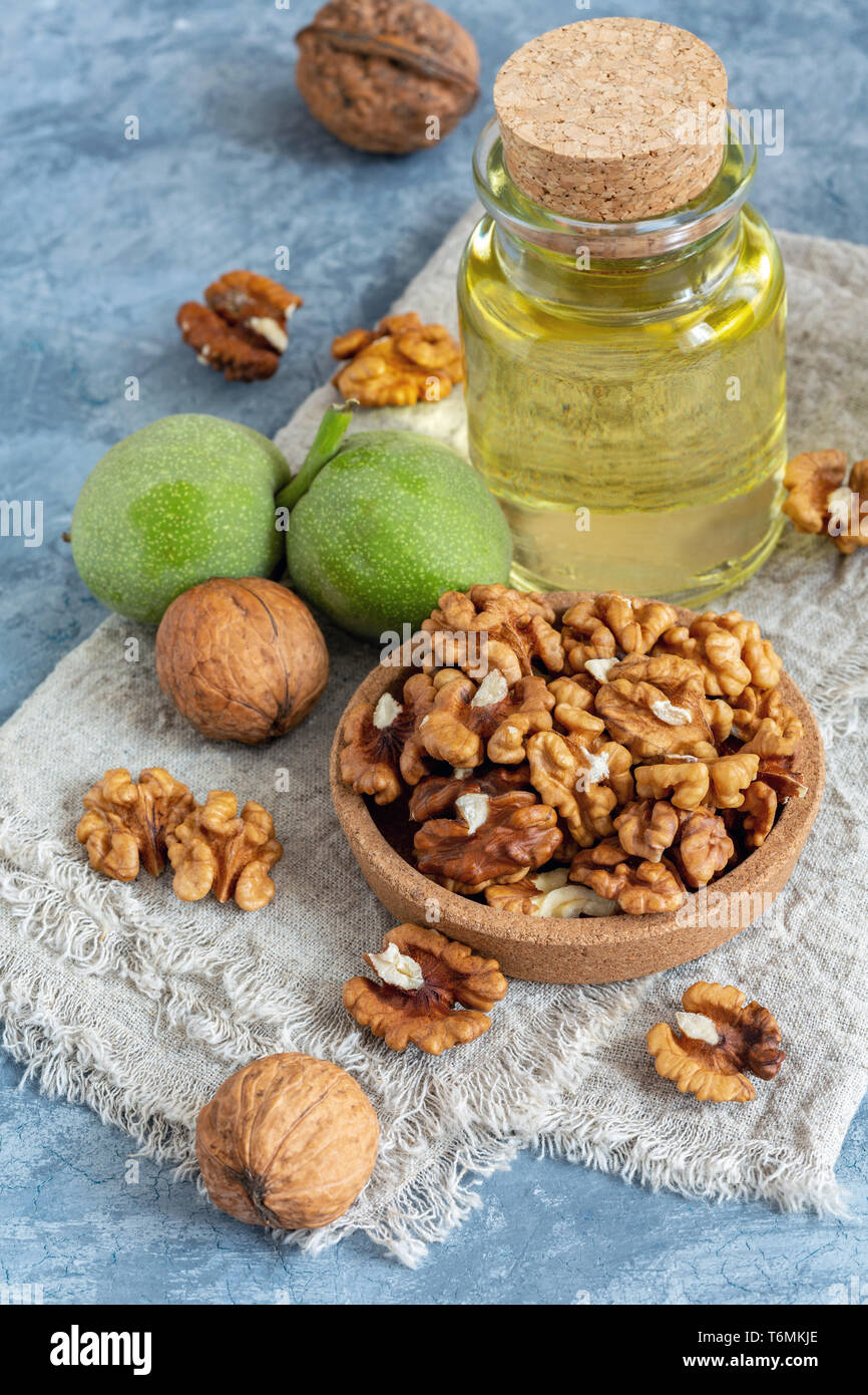 Cold pressed walnut oil and walnut kernel Stock Photo Alamy