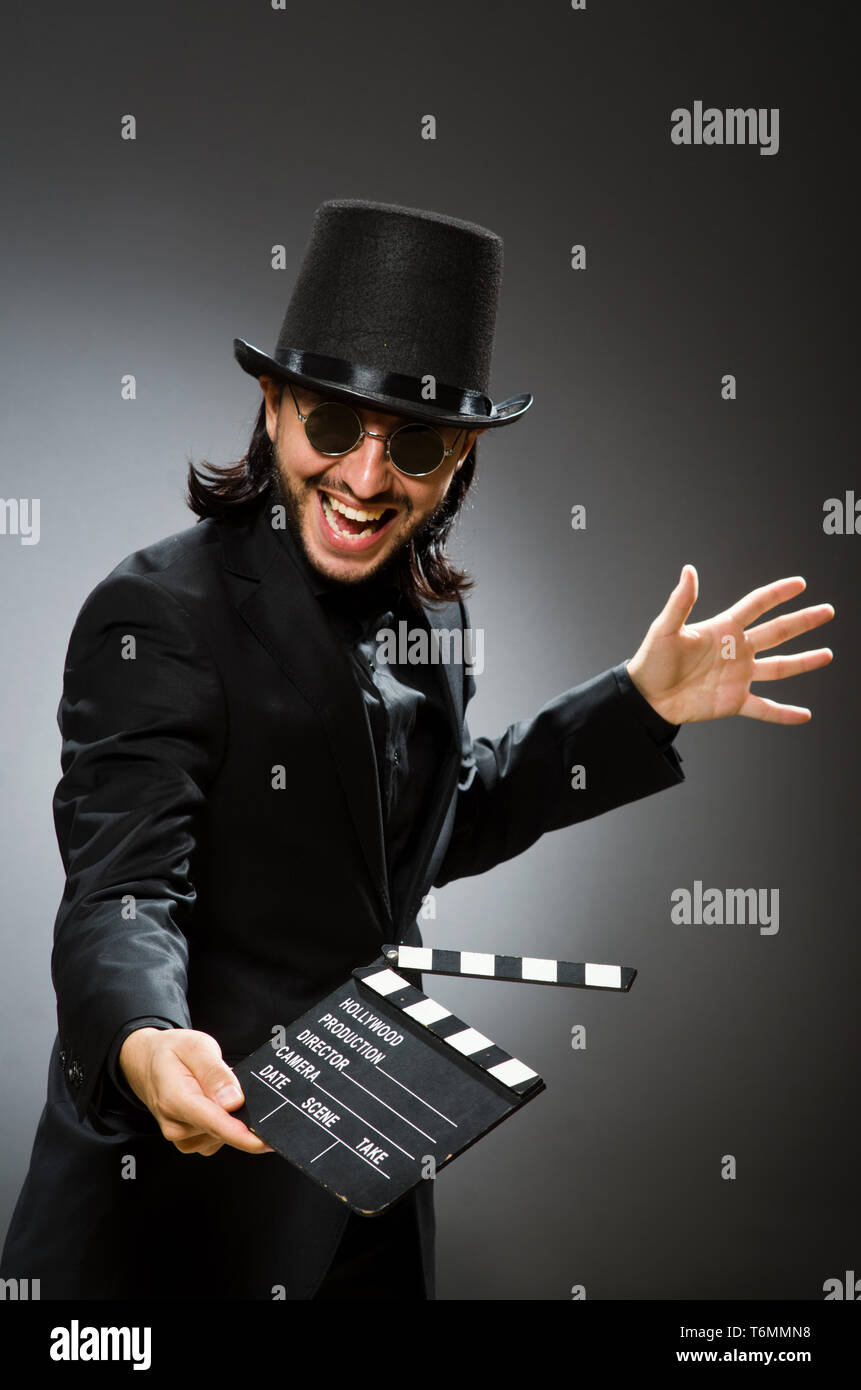 Vintage concept with man wearing black top hat Stock Photo - Alamy