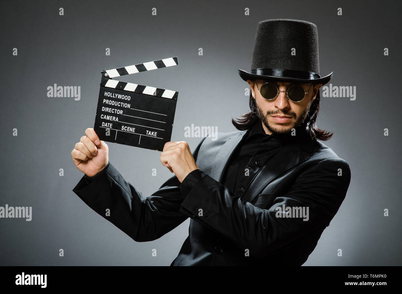 Vintage concept with man wearing black top hat Stock Photo - Alamy