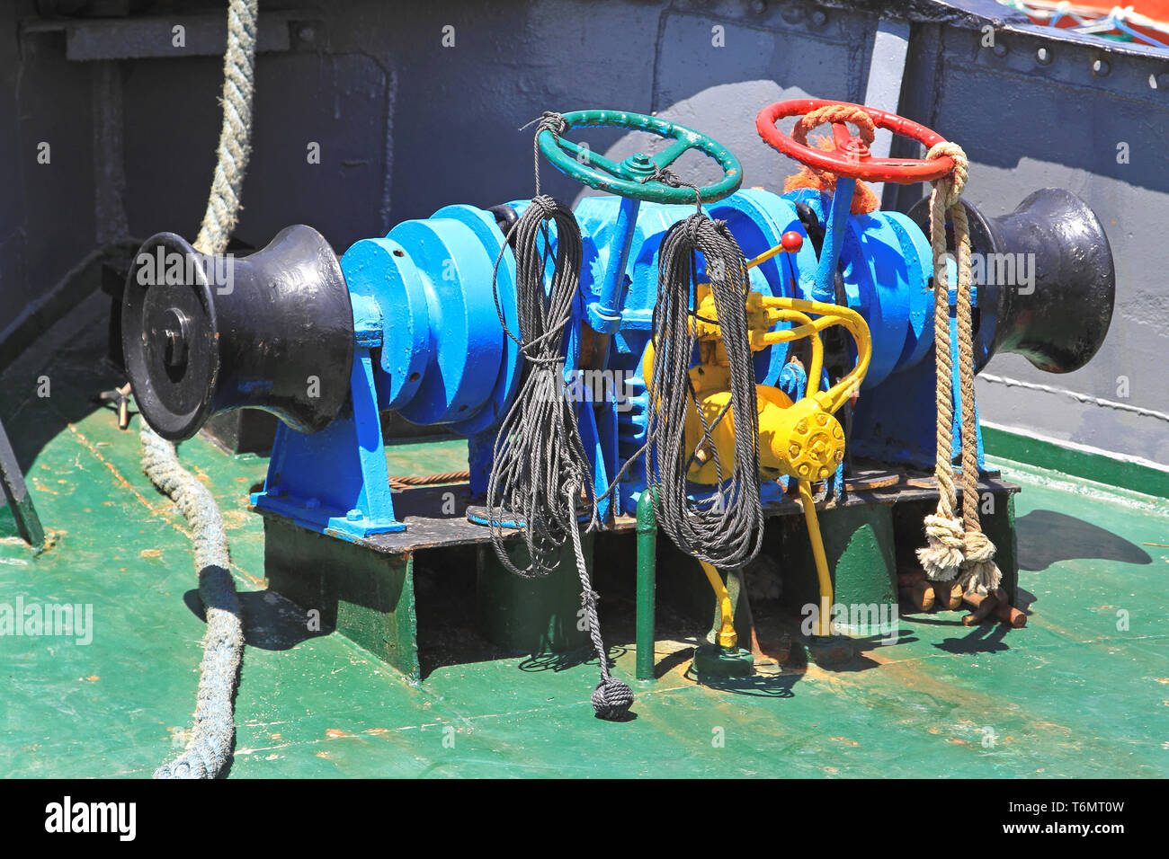 Hydraulic anchor windlass at small tug boat Stock Photo Alamy