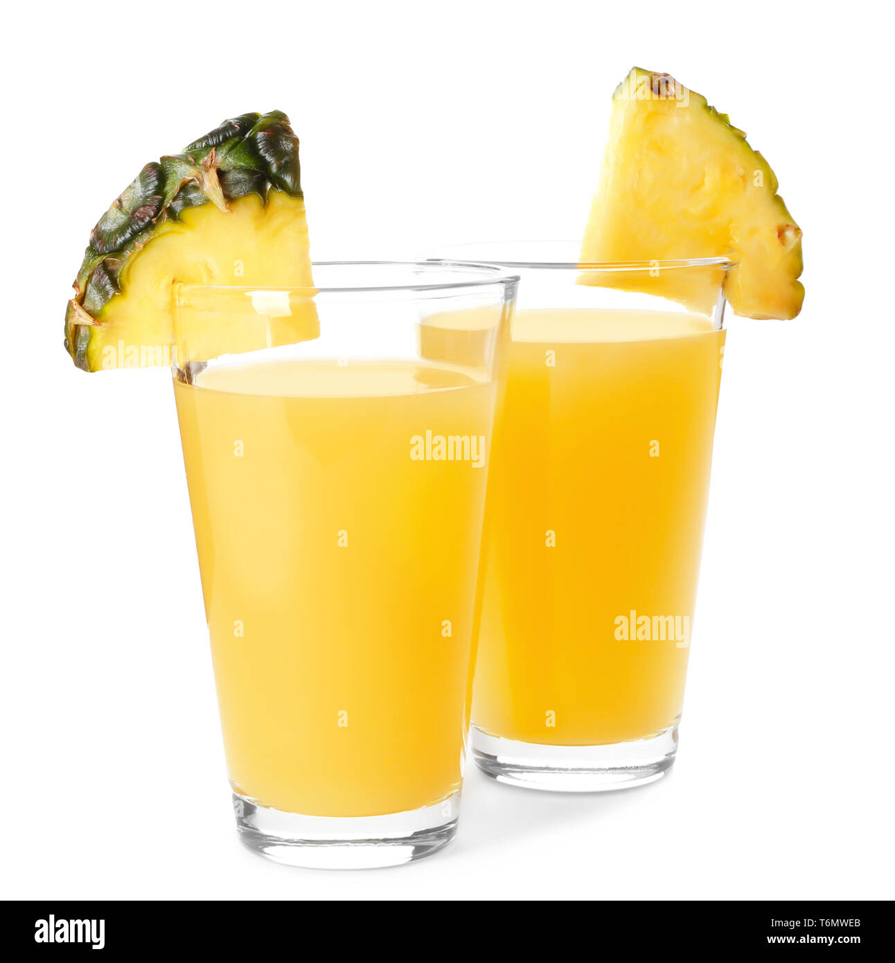 Glasses with tasty fresh pineapple juice on white background Stock ...
