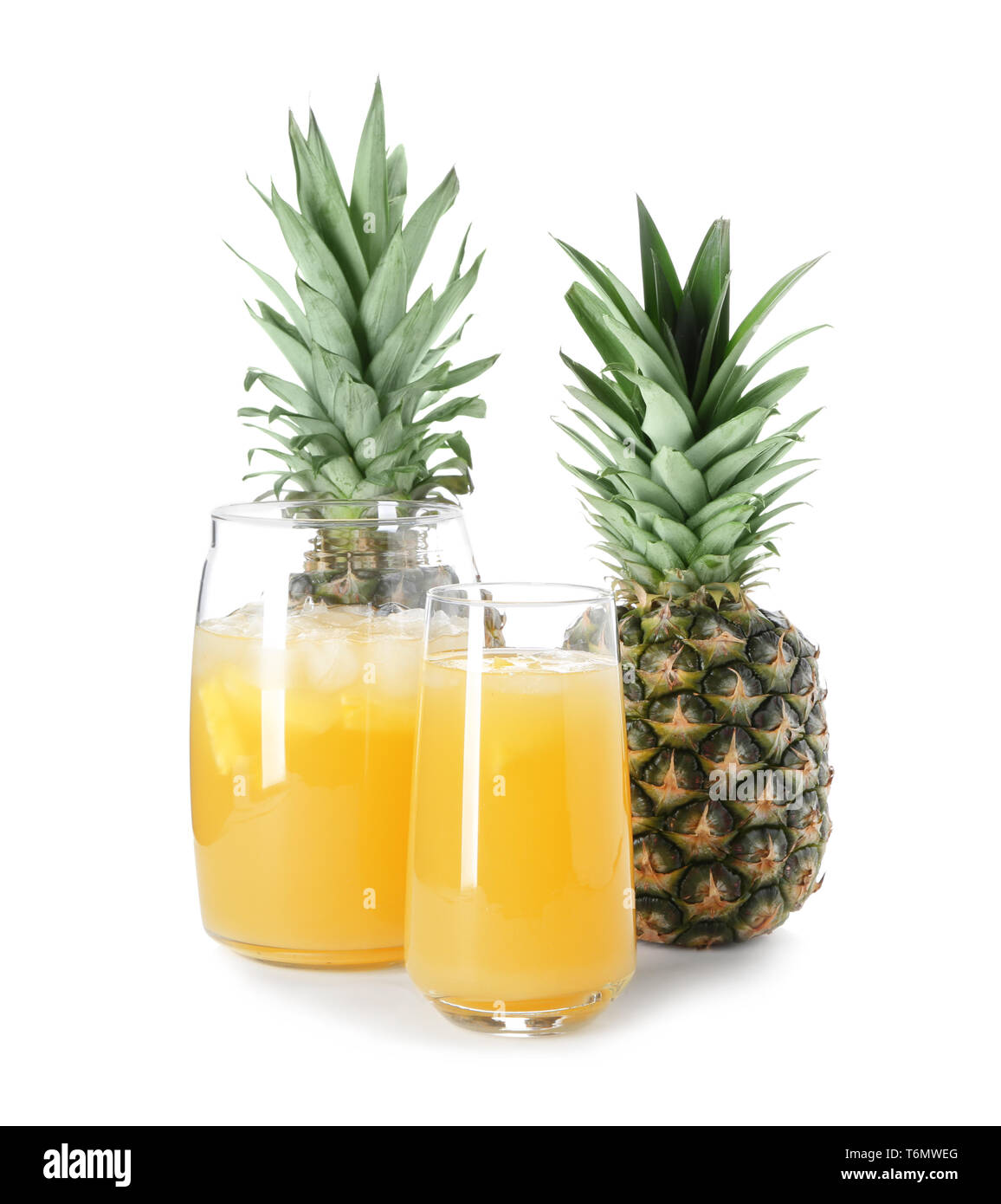 Glasses with tasty fresh pineapple juice on white background Stock ...