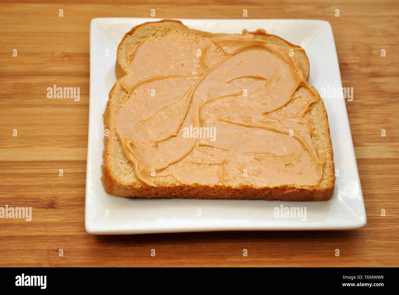 Peanut Butter on Wheat Bread Stock Photo Alamy