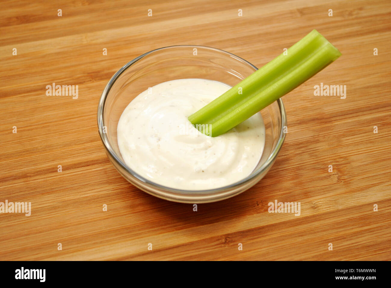 Celery in a Bowl with Dipping Sauce Stock Photo