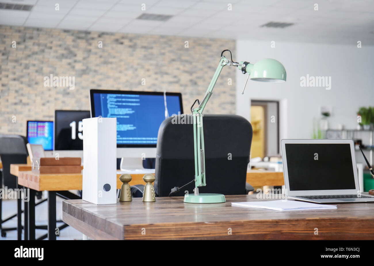 Office interior with computers and tables. Workplace design Stock Photo