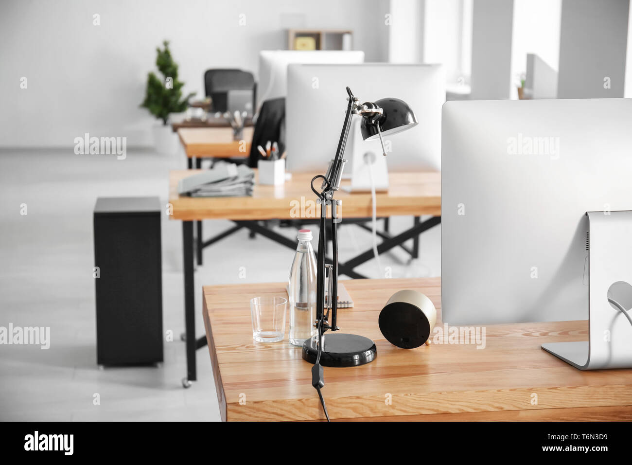 Office interior with computers and tables. Workplace design Stock Photo