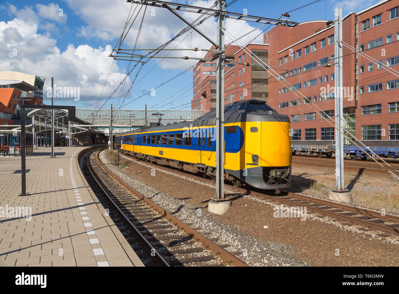 Train leaving Dutch station of Amersfoort Stock Photo