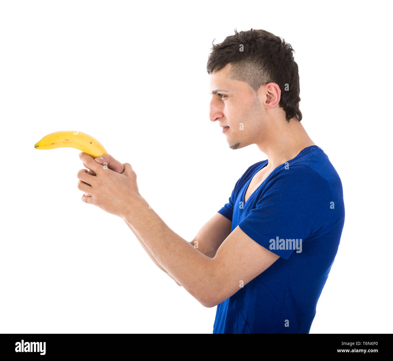 Man shooting with a banana Stock Photo