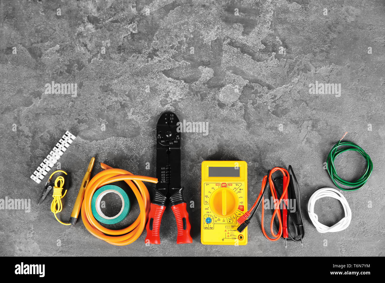Flat lay composition with electrical tools on grey background Stock Photo