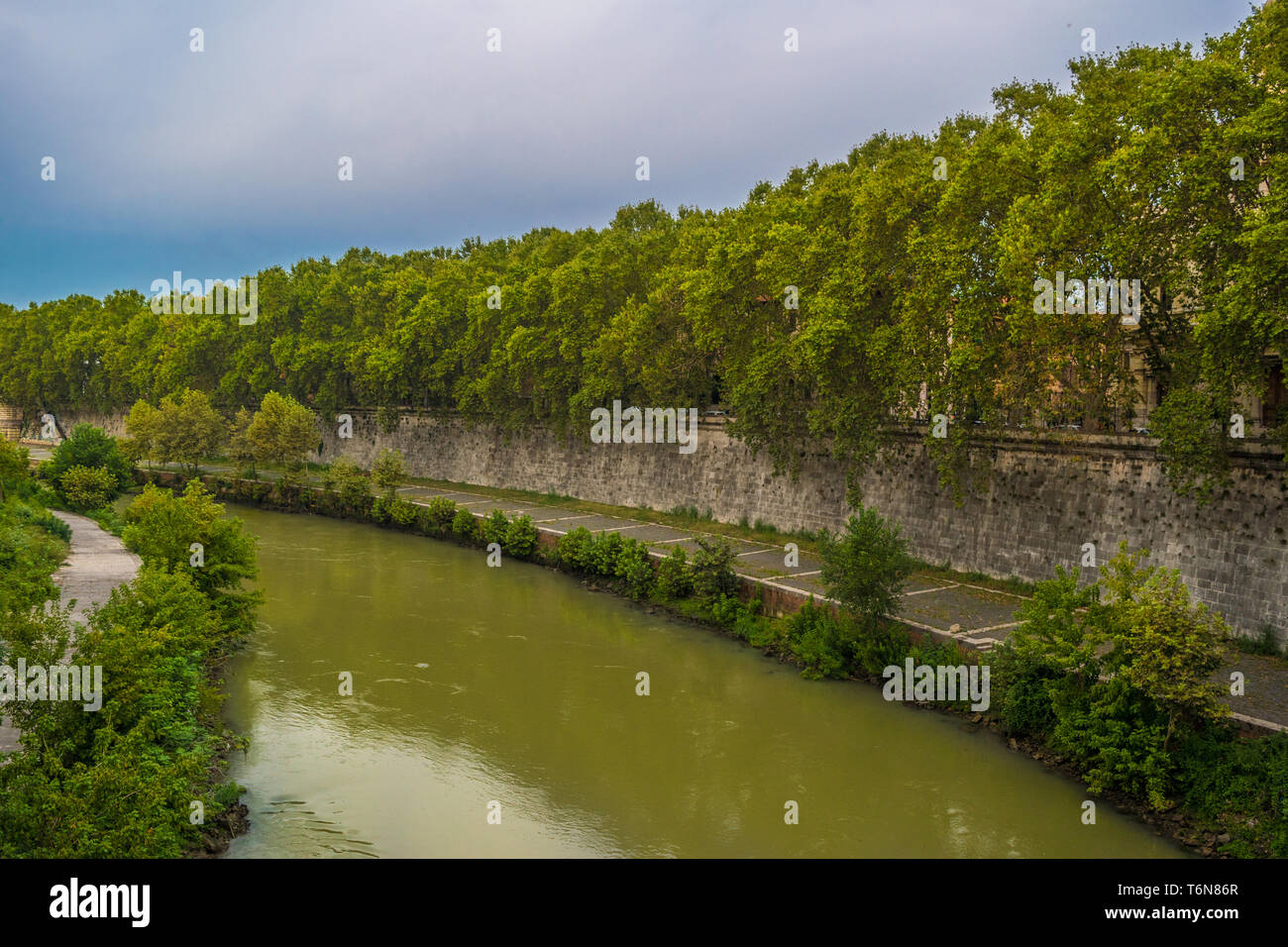 Tiber River under the Fabricio Bridge in Rome - Italy Stock Photo