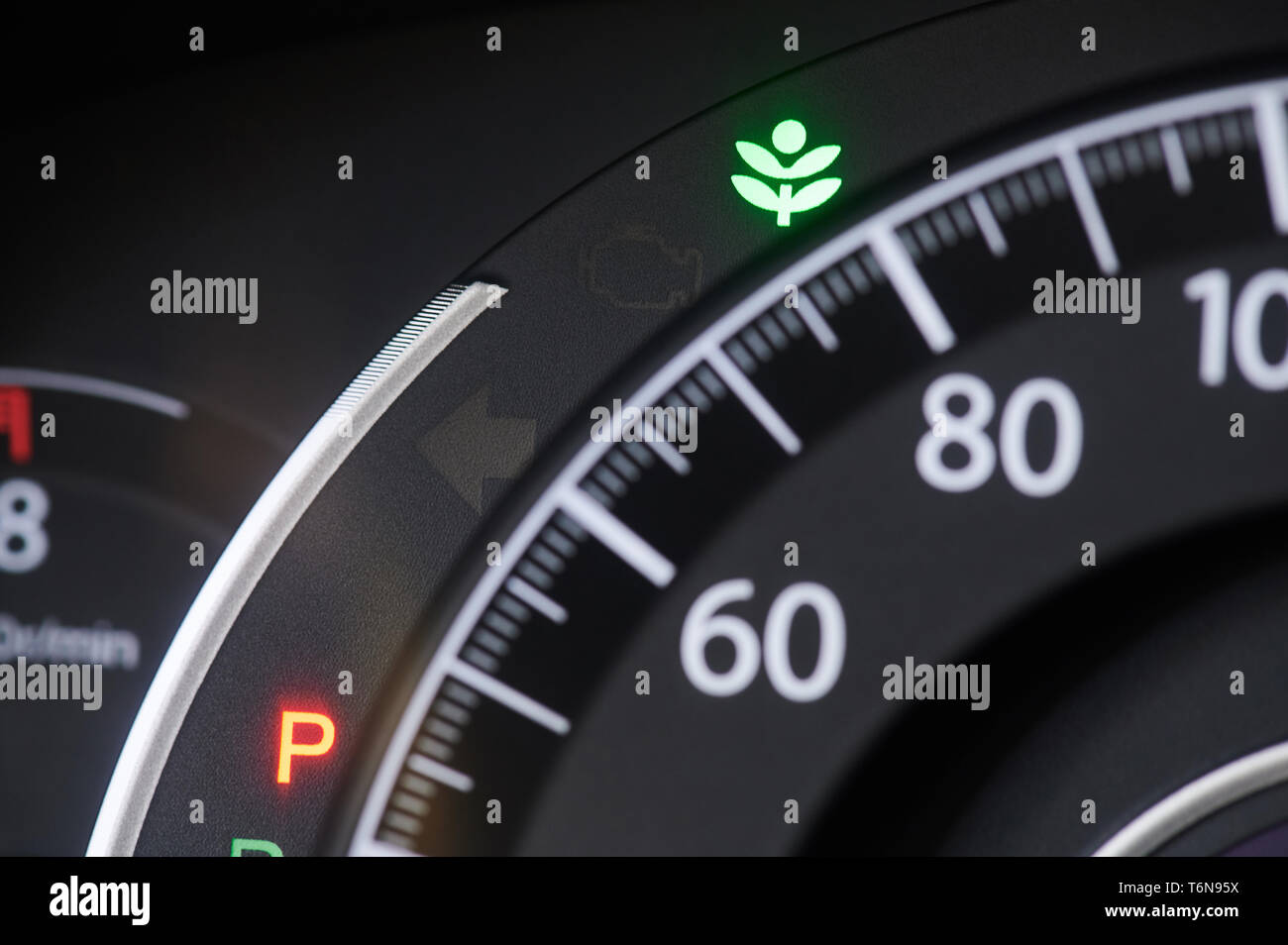 Eco sign on modern car dashboard close up view Stock Photo