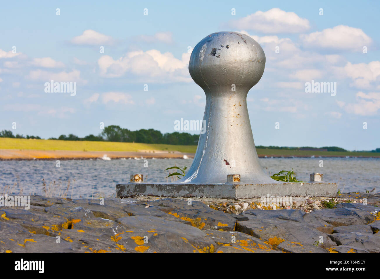 Seascape from pier with a bollard, the Netherlands Stock Photo
