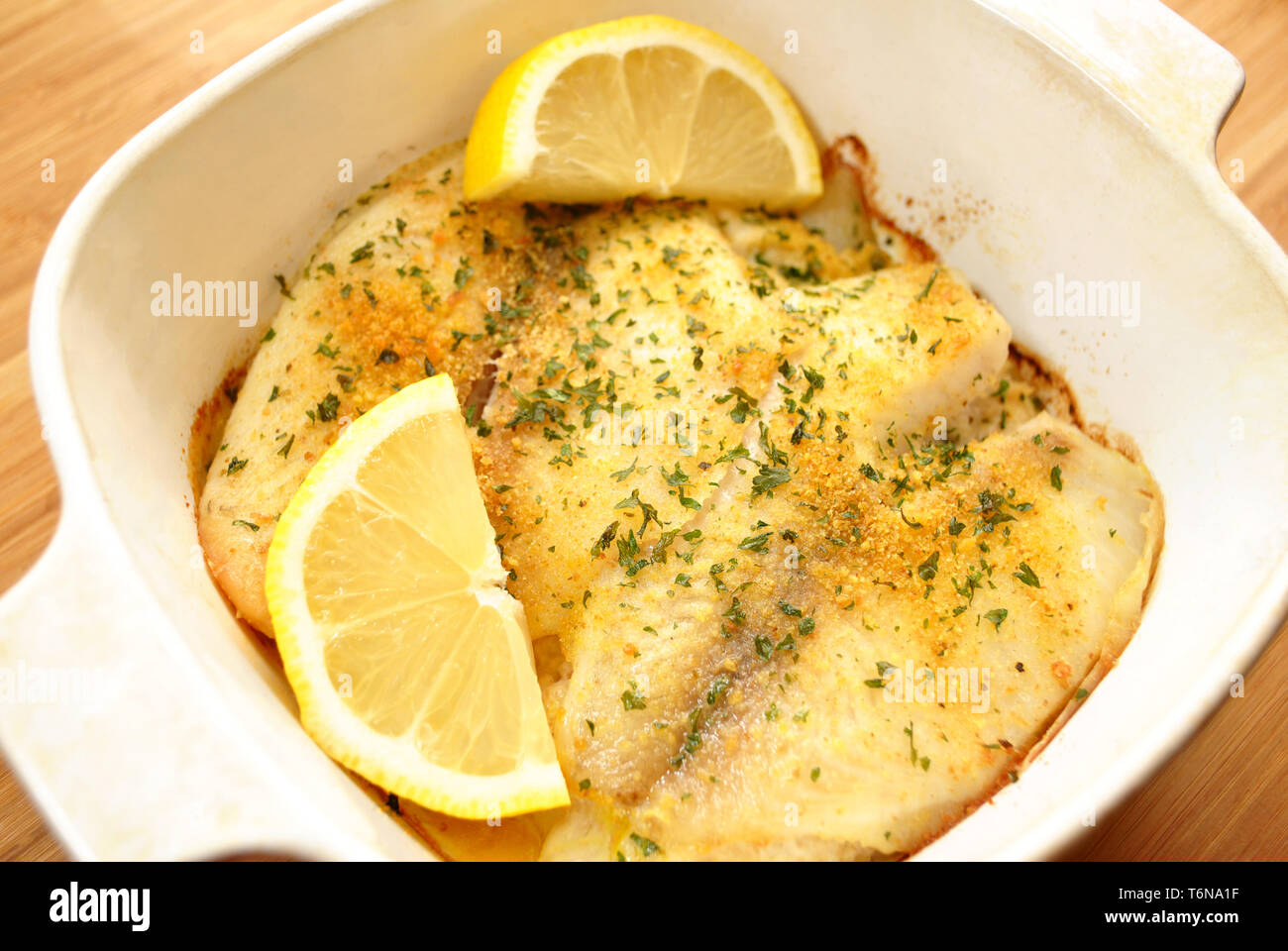 Stuffed White Fish Casserole with Lemon Stock Photo
