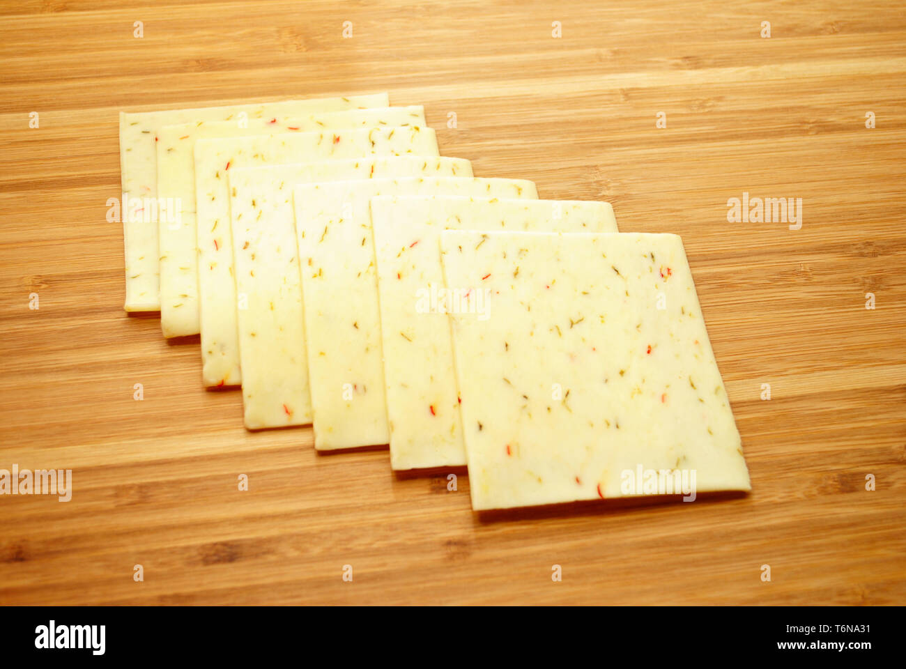 Pepper Jack Cheese Slices Stock Photo