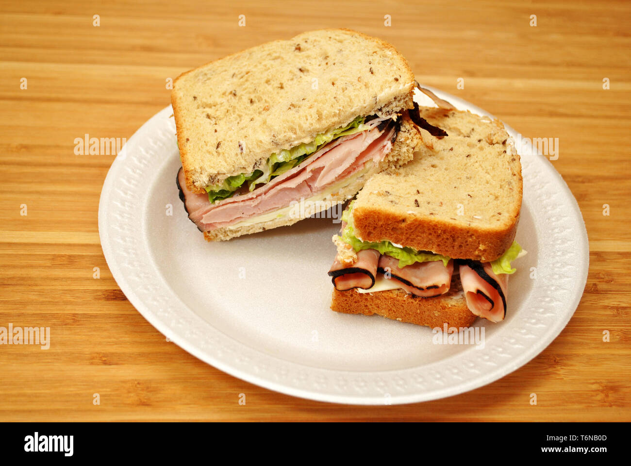 Healthy Ham Sandwich with Rye Bread Cut in Half Stock Photo