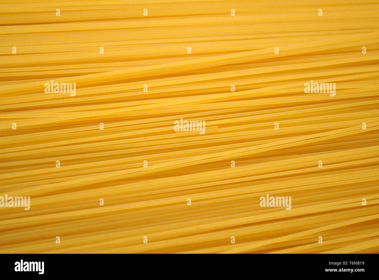 Raw Dry Spaghetti Pasta Background Stock Photo