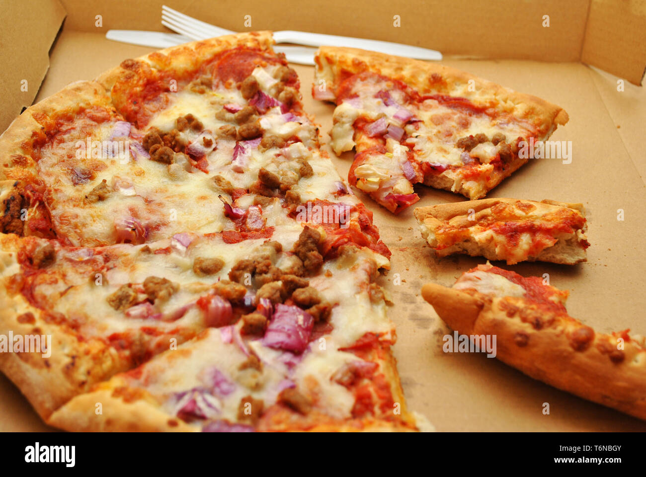 Meat Pizza with Onions in a Takeout Box Stock Photo Alamy