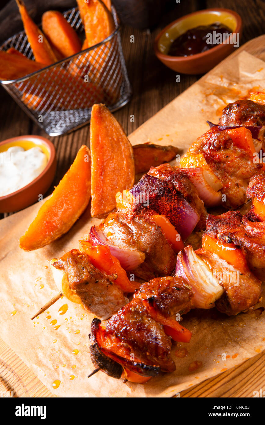 sweet potato fries with spicy paprika shashlik Stock Photo Alamy
