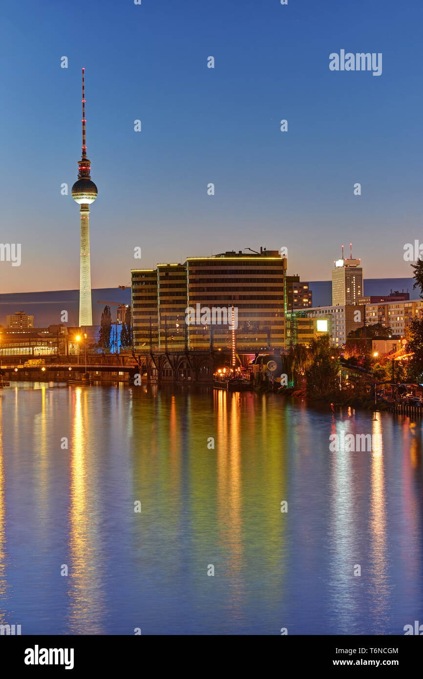 Twilight at the river Spree in Berlin with the famous Television Tower in the back Stock Photo