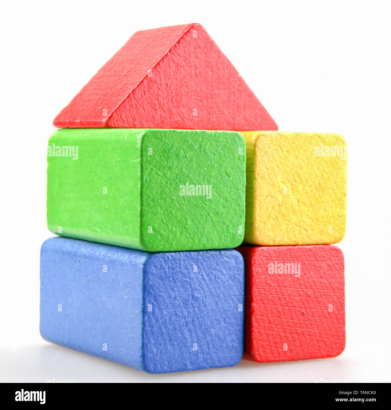 Wooden building blocks isolated on white background Stock Photo - Alamy