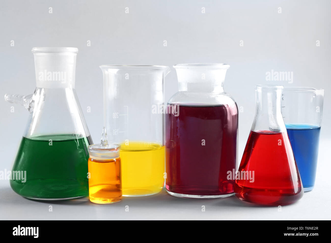 Chemical glassware with samples on light background Stock Photo Alamy