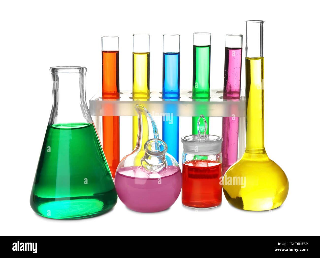 Chemical glassware with colorful samples on white background Stock
