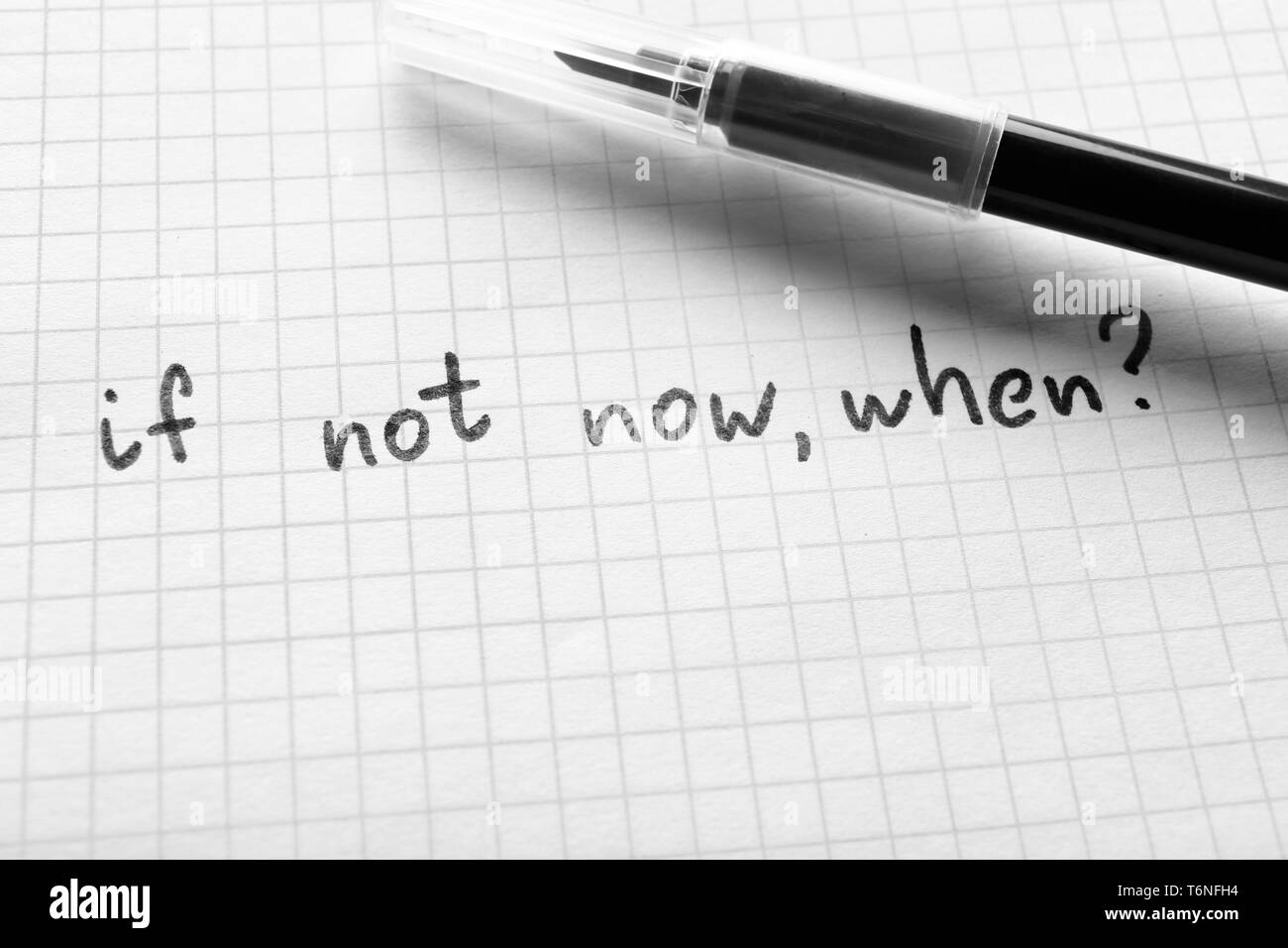 Sheet of paper with inspirational phrase and marker Stock Photo Alamy