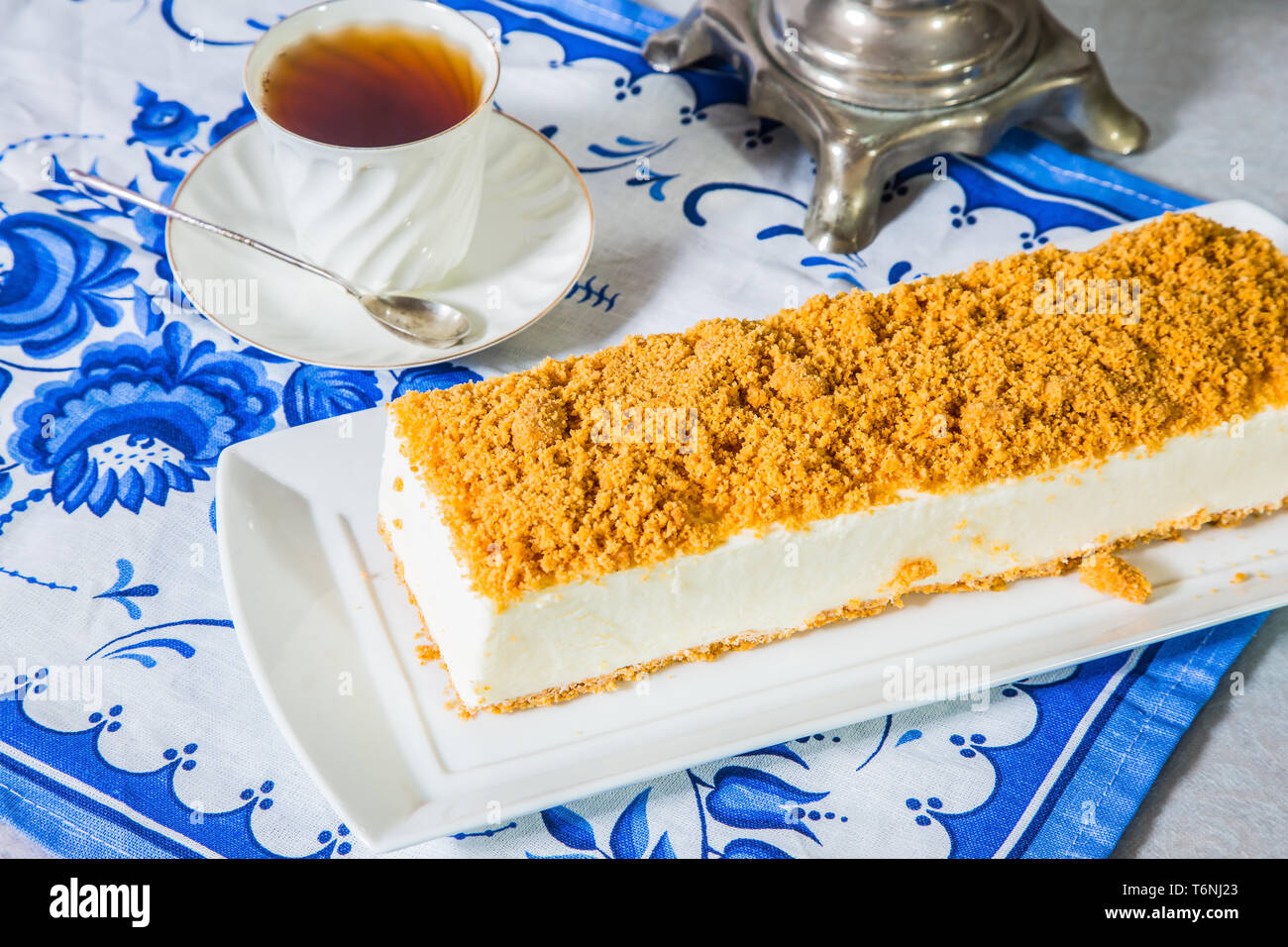 Cheesecake with sweet orange crumbs Stock Photo