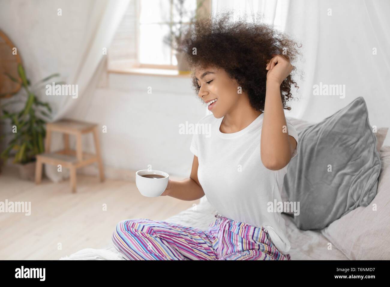 African american woman drinking tea hi-res stock photography and images ...